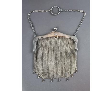 A continental white metal mounted mesh purse, stamped '935', 11cm wide.