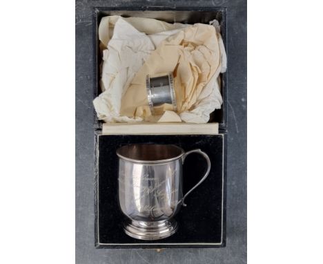 A cased silver Christening mug, by&nbsp;Adie Brothers Ltd, Birmingham 1939, height to handle 8.5cm; together with a silver na