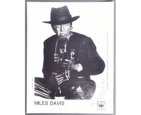 Miles Davis (1926-1991 - American Jazz Trumpeter - autographed 8x10" official CBS Records promotional black and white photogr