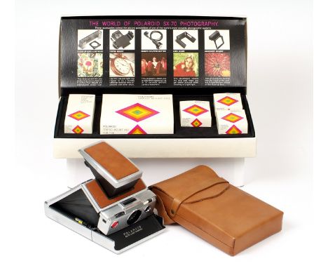 Polaroid SX-70 Instant Film Camera Outfit. Comprising chrome and tan SX-70 (cosmetically very good but no film pack so unable