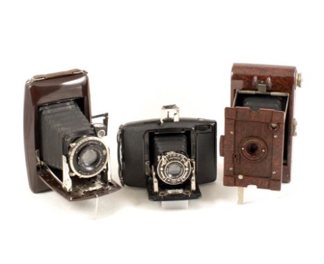 Group of Three Folding Bakelite Roll Film Cameras. Comprising two uncommon Ebner cameras (both condition 4F). 6x9 and a 6x4.5