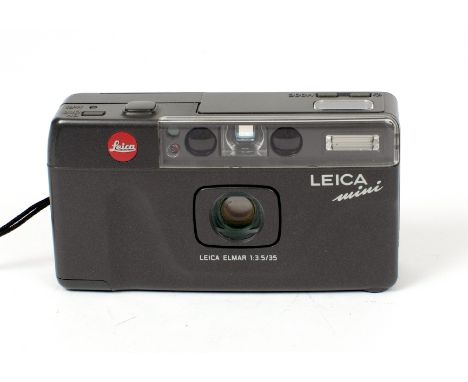 Leica Mini 35mm Compact Film Camera. (condition 5F) fixed Elmar 35mm f3.5 lens.  (Cabinet Ia)