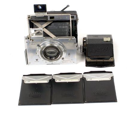 Plaubel Makina II 9x9cm CRF Camera. (condition 5F) with Anticomar f2.9 10cm lens. Includes 3 plates and a good roll film back