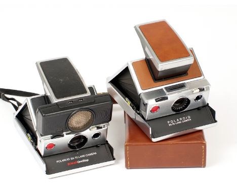 A Pair of Polaroid SX-70 Instant Print Cameras. Comprising a chrome and tan SX-70 with soft case and a black and chrome SX-70