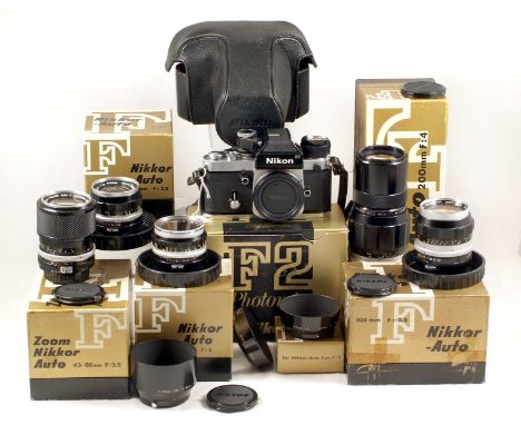 Extensive Nikon F2 Photomic Outfit. Comprising F2 body #7234129 (condition 5F) in maker's box, with ERC. Nikkor H 50mm f2 len