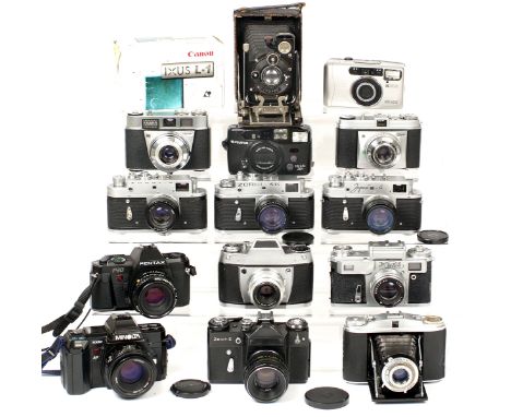 Group of Around 15 Cameras, inc Minolta 7000 with 50mm AF Lens. Also 3x Zorki, a Kiev II, Zenit-E Olympic, 2x Kodak Retenette