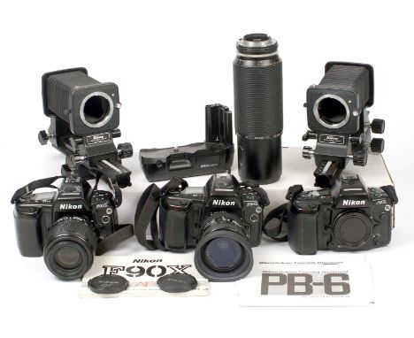 Nikon F90x Film Camera Bodies with Lenses &amp; Bellows Units. To include three F90x bodies, working, but each has a VERY sti