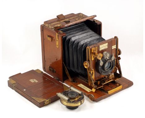 A Tropical Sanderson Hand &amp; Stand Quarter Plate Camera. (condition 5/6F). Fitted with Ross 5 1/2 inch f6.8 lens. Also a D