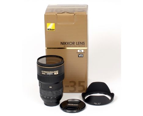 AF-S Nikkor 16-35mm f4 G ED VR Lens.  (condition 4E). With UV filter, caps and hood, in makers box.  (Cabinet E)