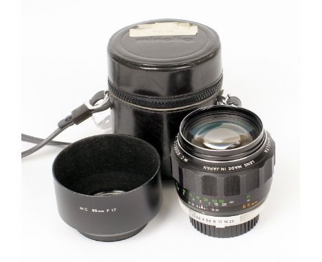 Uncommon Minolta Rokkor PF 85mm f1.7 Portrait Lens. (condition 4/5F) with correct hood and case. (Cabinet A) 