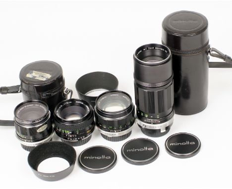 Four Early Minolta Rokkor MD Fit Lenses. Comprising HG  35mm f2.8 (filter stuck) with hood and case; PF 50mm f1.7; PF 58mm f1