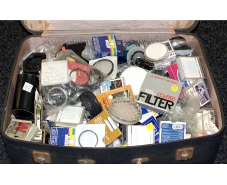 Large Suitcase of Lens Filters &amp; Stepping Rings etc. Multiple sizes, makers and conditions. (On shelf)