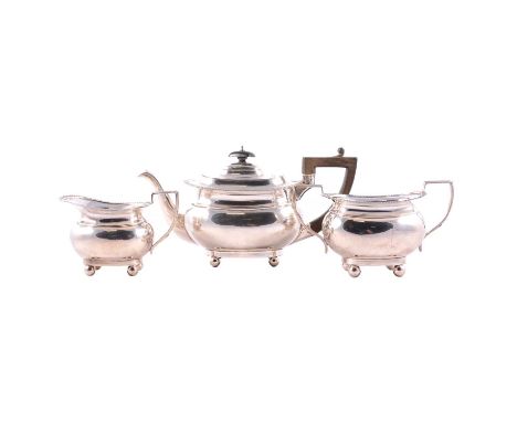 Silver three piece teaset, Charles Boyton &amp; Son Ltd, London 1909, including teapot with ebonised handle and finial, 15.5c