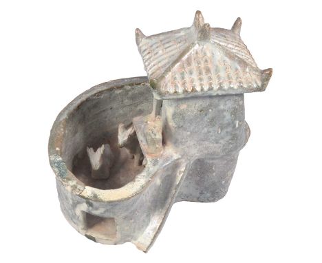 Chinese Han pottery model of a farm, with tiled building and enclosure, four animals and a trough, height 24cm.