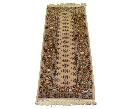 Bukhara Tekke rug, pale pink ground, 184cm x 128cm, a similar runner 184cm x 61cm; and a similar small rug, 88cm x 62cm.Qty: 