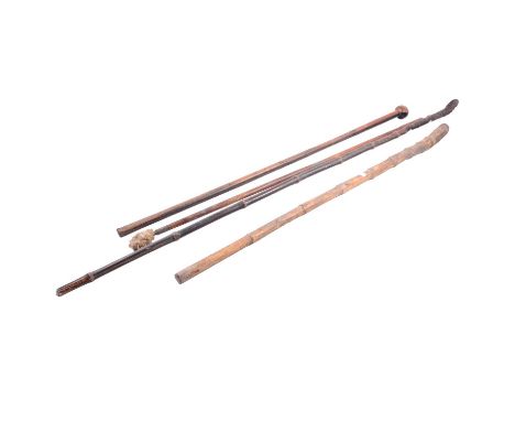 Hardwood knobkerrie/ walking stick, 90cm, two bamboo sticks, 87cm and 120cm, and a gun cleaning rod