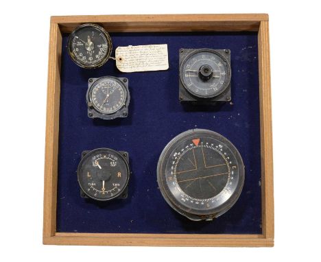 Four WWII aircraft cockpit instruments, including a Smiths Mk IIIB clock, Mk I indicator turn and slip, P10 compass, Lancaste
