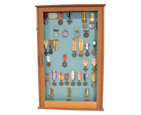 Framed collection of medals, including;Army Long Service &amp; Good Conduct medal to Corp J Flynn, Kings Regiment Rifle Corp,
