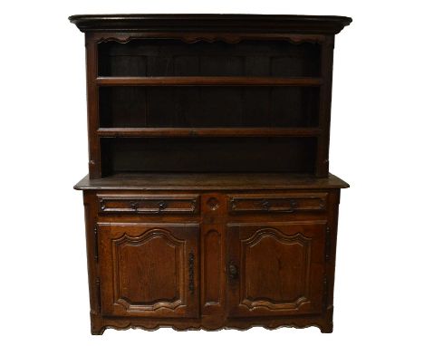 French oak dresser, moulded cornice, two shelf delft rack with panelled back, the base fitted with drawers and cupboards, wid