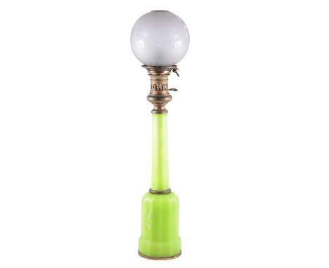 Uranium glass oil lamp, with matched etched shade damaged, facetted column, height overall 78cm.Condition report:The base is 