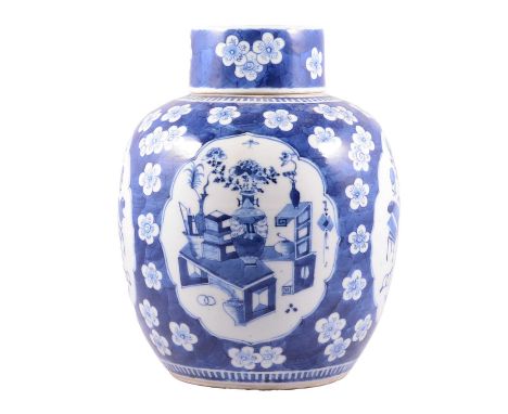 Chinese blue and white ginger jar and cover, panelled decoration with objects, double ring to the base, height 31cm.Condition