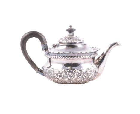 A silver bachelor teapot, Josiah Williams &amp; Co, London 1894, repousse chased acanthus leaf decoration to body, gadrooned 