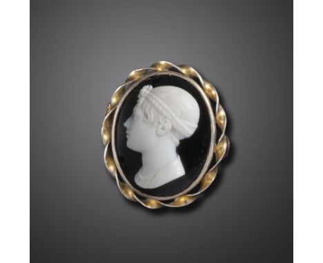An early 19th century sardonyx cameo depicting Emma, Lady Hamilton by Filippo Rega (1761 - 1833), depicted in profile with he