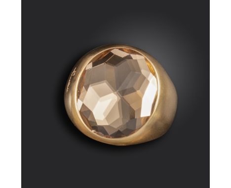 A gold 'Narciso' ring by Pomellato, set with an oval-shaped citrine in brushed pink gold, signed Pomellato to the shoulder, a