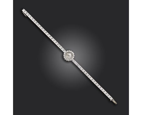 A lady's diamond cocktail wristwatch by Jaeger LeCoultre, the signed dial within diamond-set case on diamond bracelet in whit