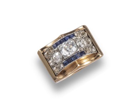 A sapphire and diamond Odeonesque ring, c1940, centred with an old cushion-shaped diamond, with a further surround of old cus