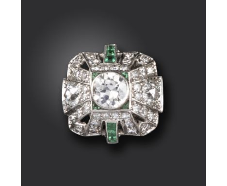 An emerald and diamond pyramidal cluster ring, set with graduated circular-cut diamonds and emeralds in platinum, size K 1/2