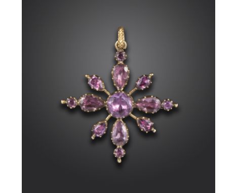 A George III amethyst cruciform brooch pendant, set with circular and pear-shaped amethysts in gold closed-back settings, wit