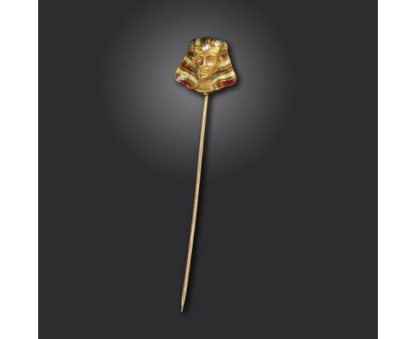 A 19th century Egyptian Revival Pharaoh's head gold stick pin, realistically formed with red and green enamel decoration to h