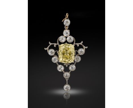 An early 20th century fancy-coloured and white diamond pendant, set with a central fancy-coloured old cushion-shaped diamond 