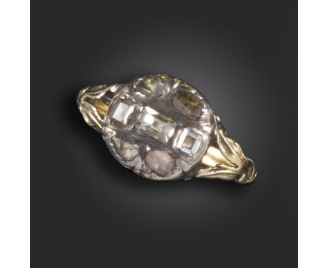 A George III diamond cluster ring, the oval-shaped centre section set with table-cut diamonds in closed-back setting, in silv