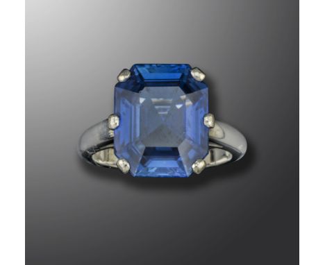 An octagonal-cut sapphire ring by Cartier, the sapphire weighs 9.50cts and set in platinum, signed Cartier and inventory numb