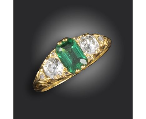 A Victorian emerald and diamond half-hoop ring, set with an emerald-cut emerald, two old circular-cut diamonds and rose-cut d