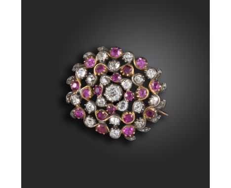 A George III ruby and diamond brooch, set with old cushion-shaped rubies and diamonds, mounted in silver on gold, 2.5cm wide,
