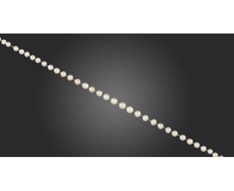 A single-row natural pearl necklace, the pearls graduate from 3.2 - 6.3mm, with a rose-cut diamond clasp, 53cm long Accompani