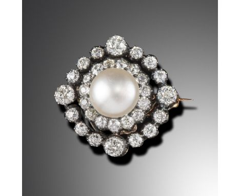 A Victorian freshwater natural pearl and diamond target brooch pendant, of quatrefoil design, the button-shaped freshwater pe
