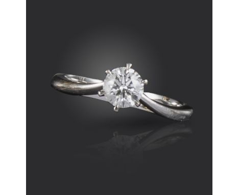 A diamond solitaire ring, the round brilliant-cut diamond weighs approximately 0.55cts, set in platinum, size K 1/2