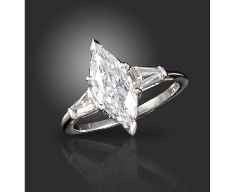 A diamond solitaire ring, the marquise-shaped diamond weighs approximately 1.60cts, set with two tapered baguette shoulder di