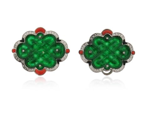 λ A pair of gem-set jade and gold brooches, the scroll carved jade plaques (damaged) are set within a surround of circular-cu