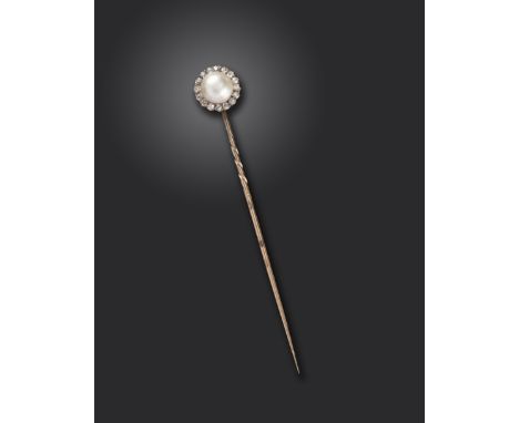 A Victorian natural pearl and diamond stick pin, the natural half pearl set within a surround of old cushion-shaped diamonds 