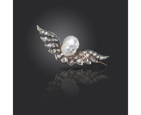 A Victorian diamond and moonstone cherub brooch, the carved moonstone head set above rose-cut diamond wings in silver on gold