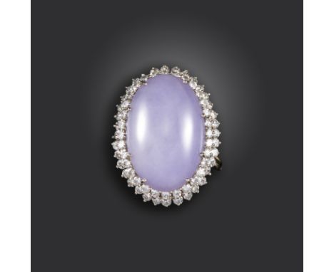 A French lavender jade and diamond ring, the jadeite jade cabochon set within double surround of circular-cut diamonds in yel