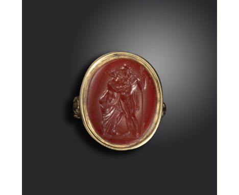 A 19th century carnelian intaglio depicting Mars and Venus, Venus embracing Mars and imploring him not to go to war, in a 19t