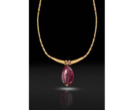 An impressive spinel bead pendant, the spinel weighs approximately 108cts, measuring 31.28 x 20.80 x 16.75mm, suspended from 