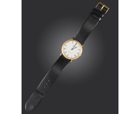 A gentleman's gold Calatrava wristwatch by Patek Philippe, the signed white dial with black Roman numerals, quartz movement, 