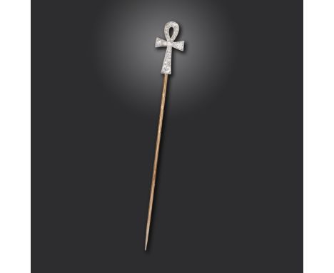 An early 20th century Egyptian Revival ankh stick pin, millegrain-set with graduated old circular-cut diamonds in platinum, g